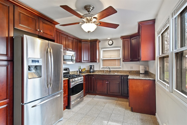 502 South Mt Prospect Road Des Plaines, IL 60016 - Photo 8 of 18 a large kitchen with stainless steel appliances granite countertop a refrigerator a stove a sink and dishwasher