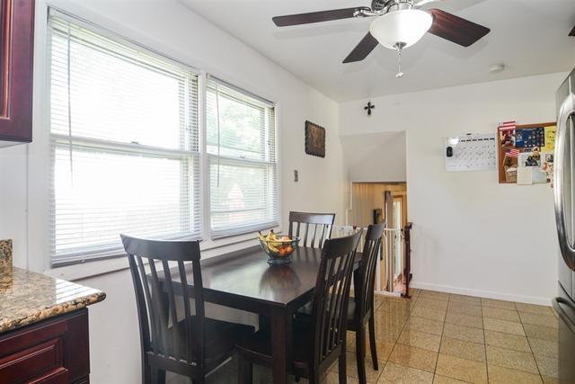502 South Mt Prospect Road Des Plaines, IL 60016 - Photo 9 of 18 a view of a dining room with furniture window and outside view