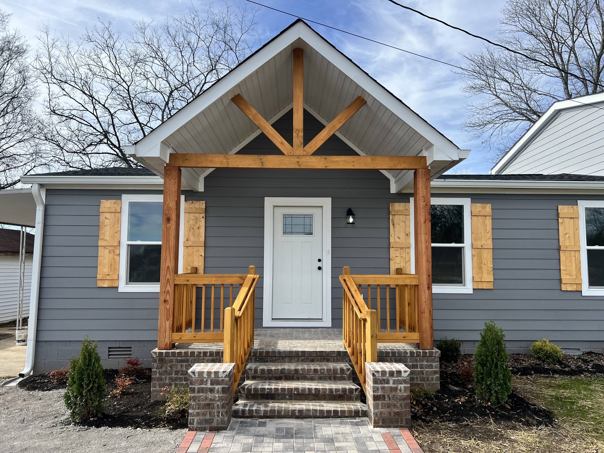 5890 Cainsville Road Lebanon, TN 37090 - Photo 1 of 59 a front view of a house with patio