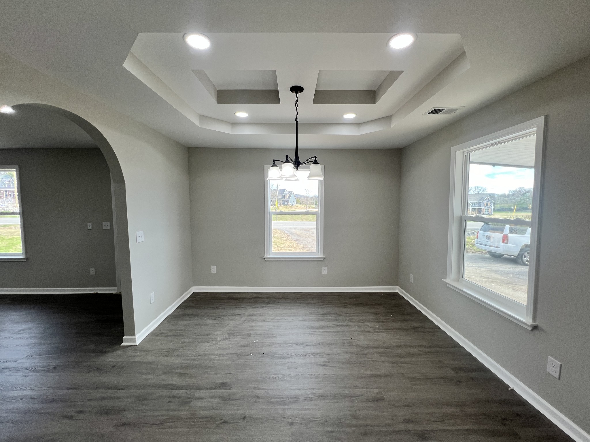 5890 Cainsville Road Lebanon, TN 37090 - Photo 11 of 59 an empty room with wooden floor and windows