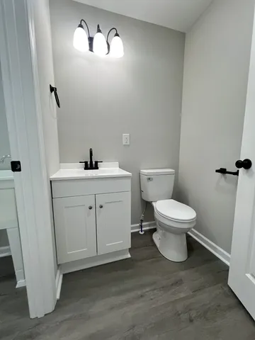 a view of entryway with wooden floor