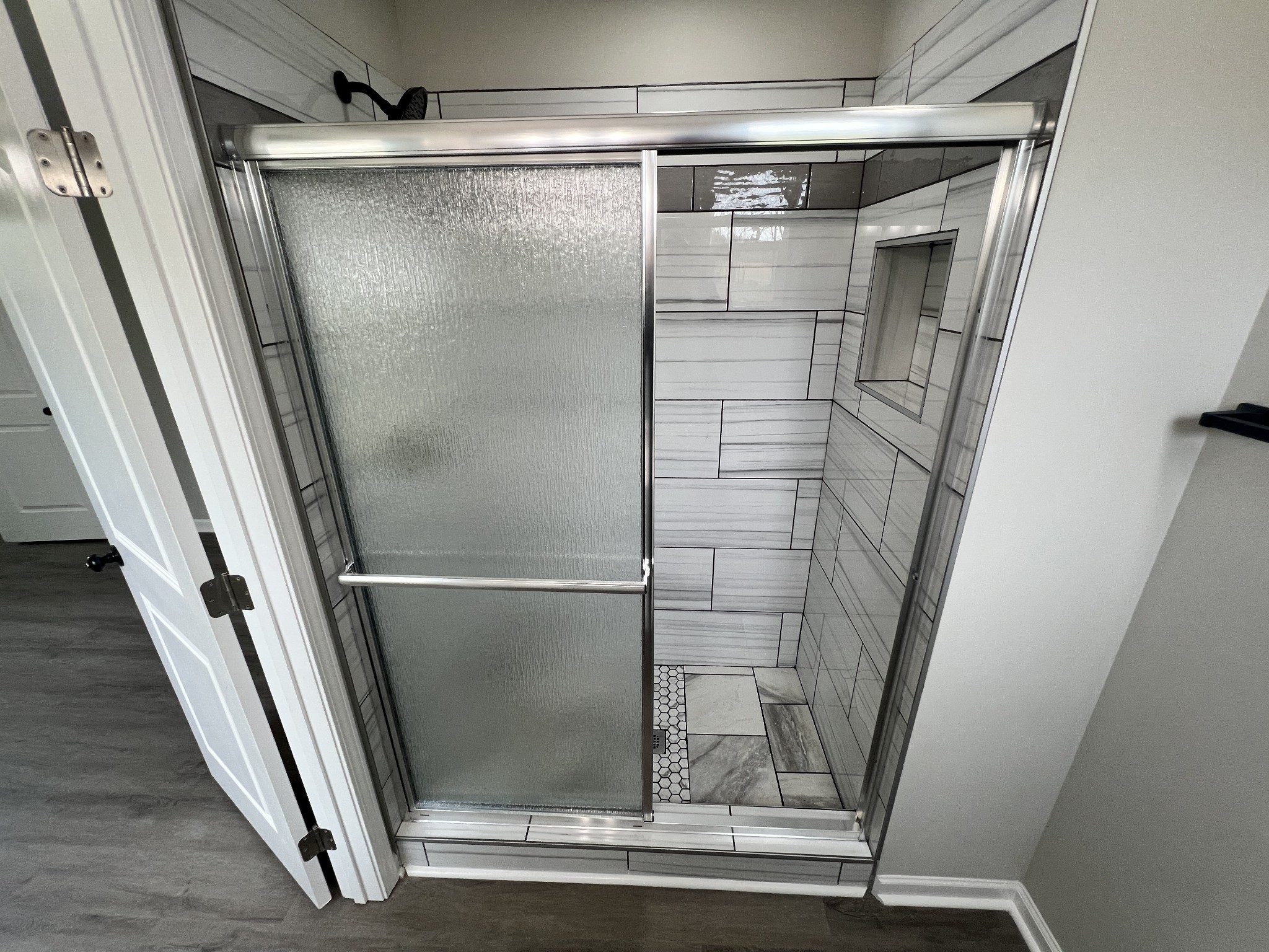 5890 Cainsville Road Lebanon, TN 37090 - Photo 32 of 59 a bathroom with a glass door shower and closet