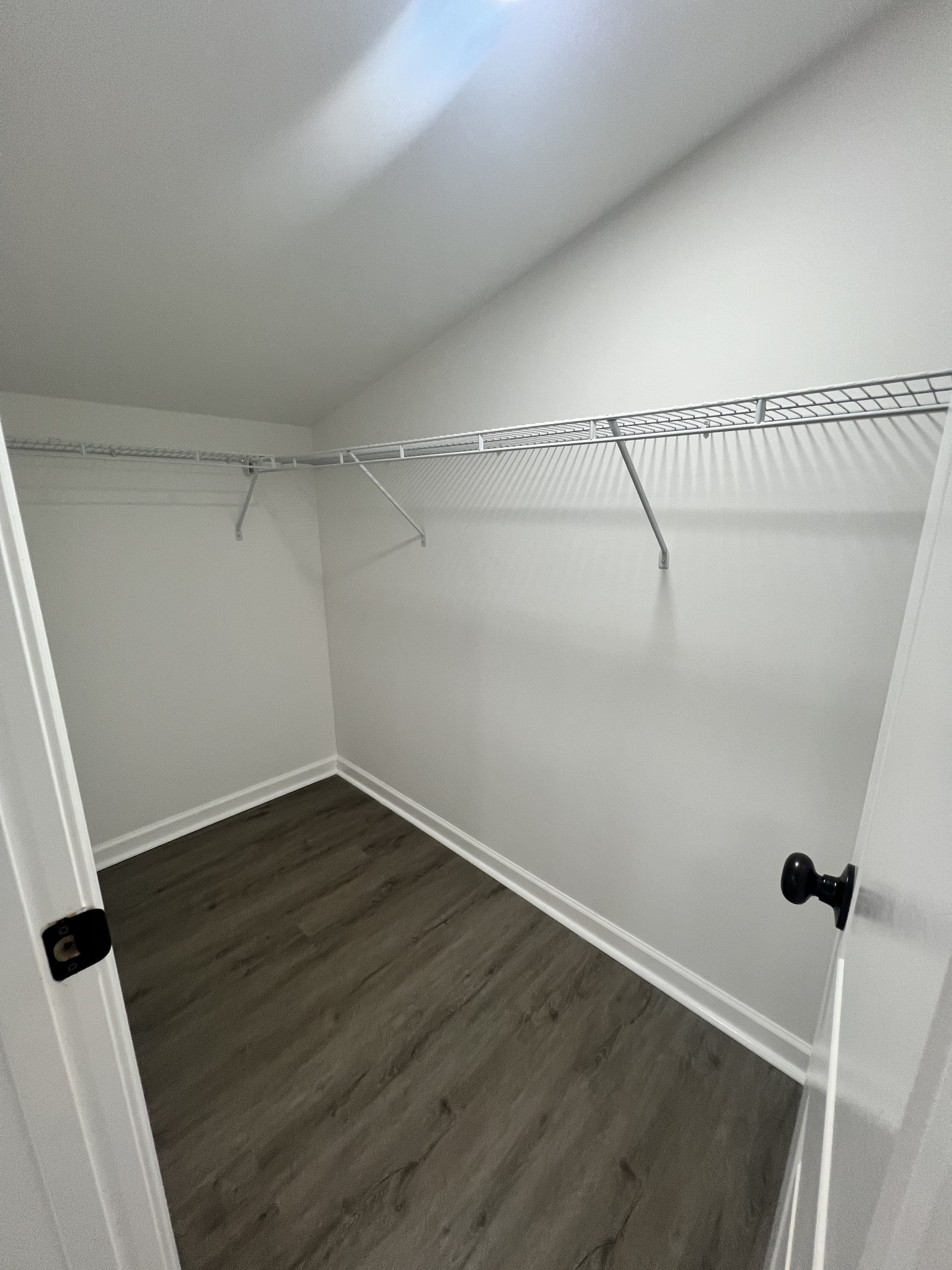 5890 Cainsville Road Lebanon, TN 37090 - Photo 45 of 59 a view of a room with wooden floor and white walls