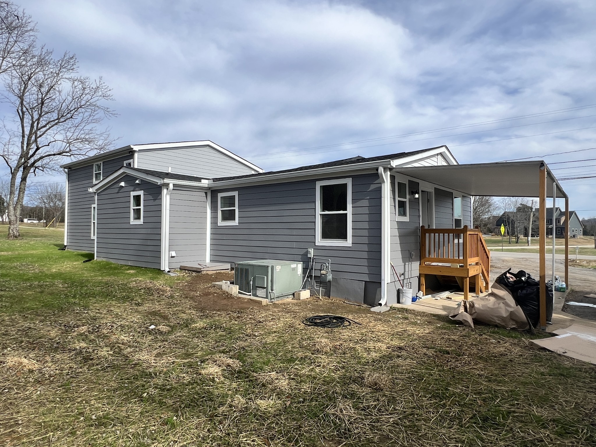 5890 Cainsville Road Lebanon, TN 37090 - Photo 6 of 59 a backyard of a house with table and chairs