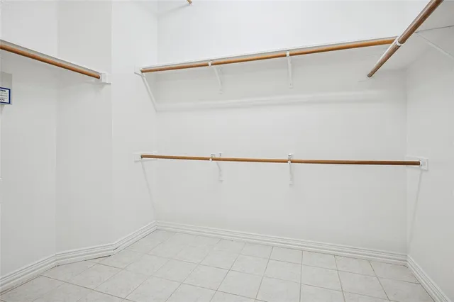 a view of an empty walk in closet
