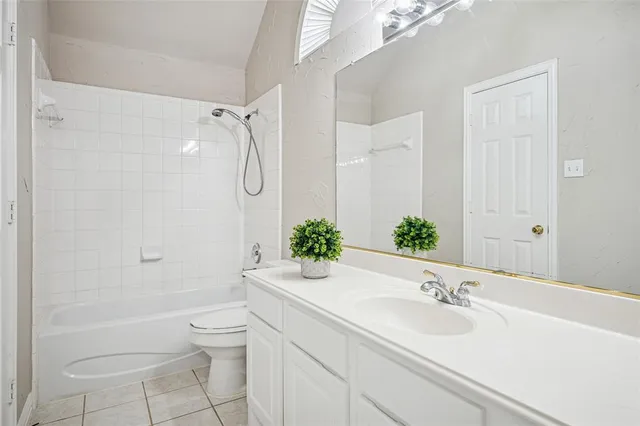 a room with wooden floor and a window