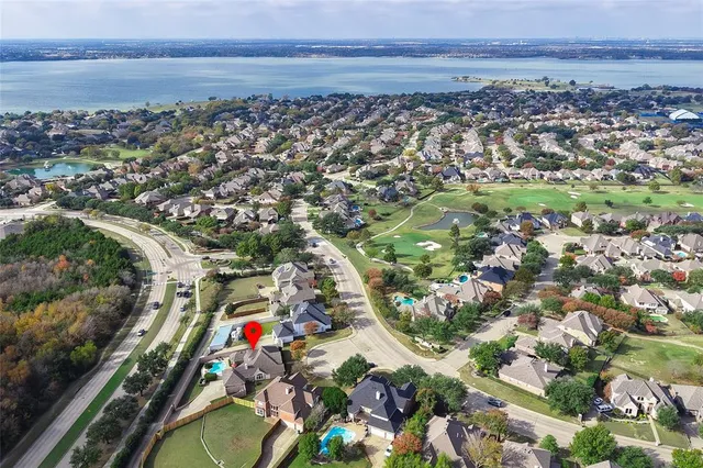 an aerial view of house with a swimming pool