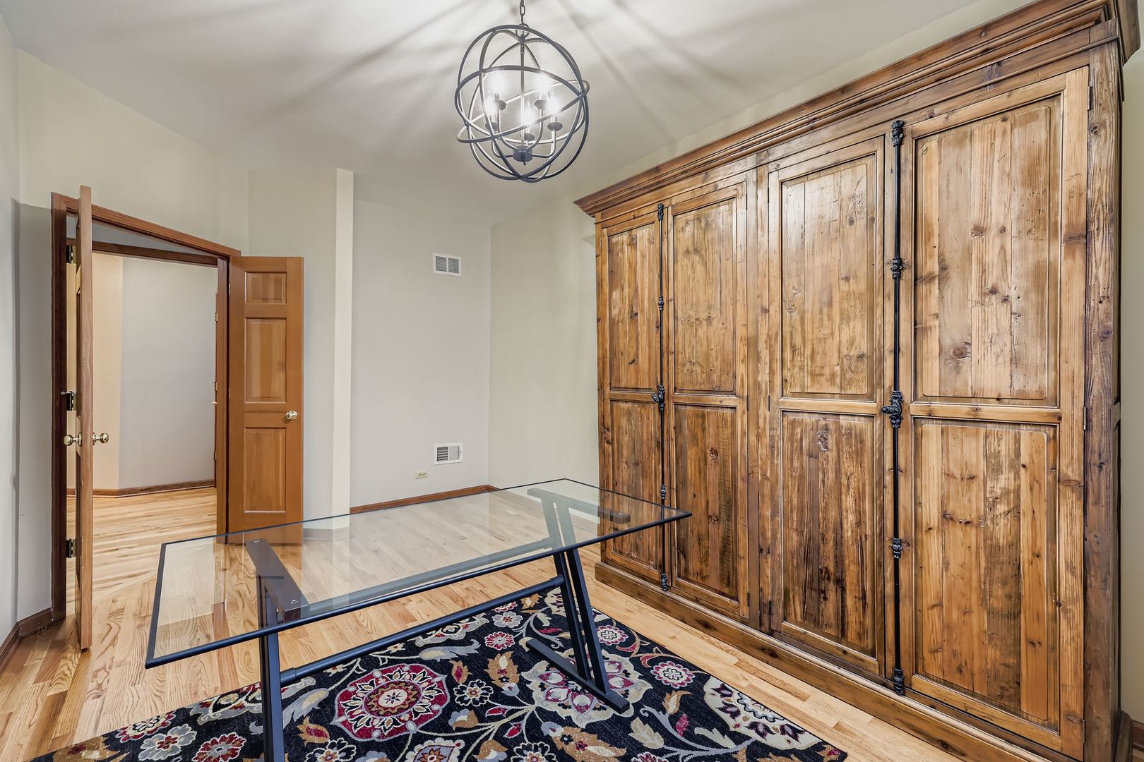 845 Harmon Boulevard Hoffman Estates, IL 60169 - Photo 16 of 33 a view of a hallway with wooden floor