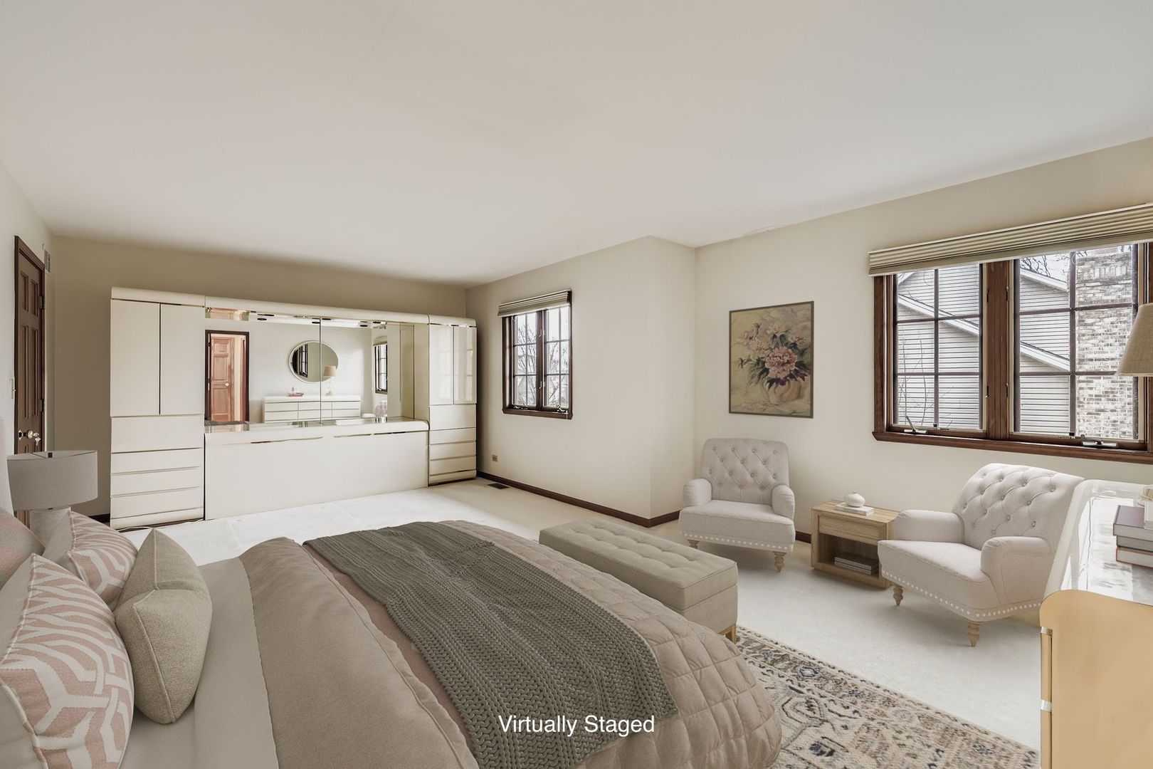 845 Harmon Boulevard Hoffman Estates, IL 60169 - Photo 18 of 33 a spacious bedroom with a large bed a couch and two windows