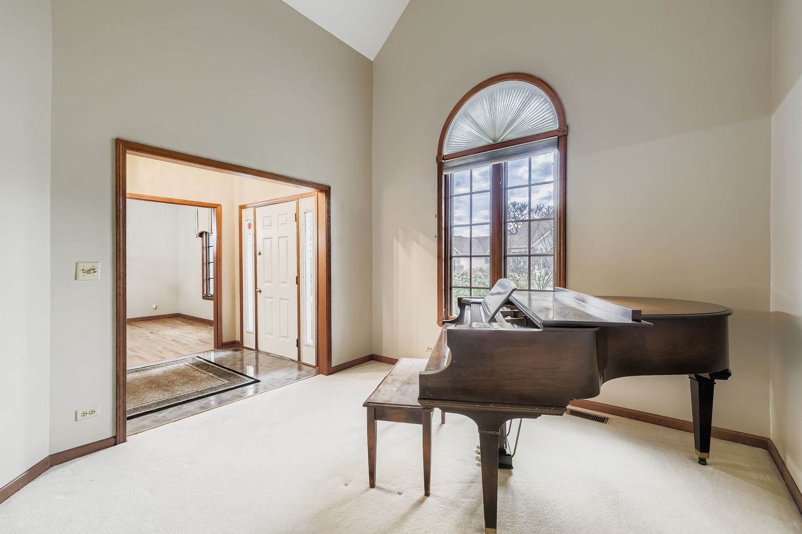 845 Harmon Boulevard Hoffman Estates, IL 60169 - Photo 3 of 33 a living room with furniture and a large window