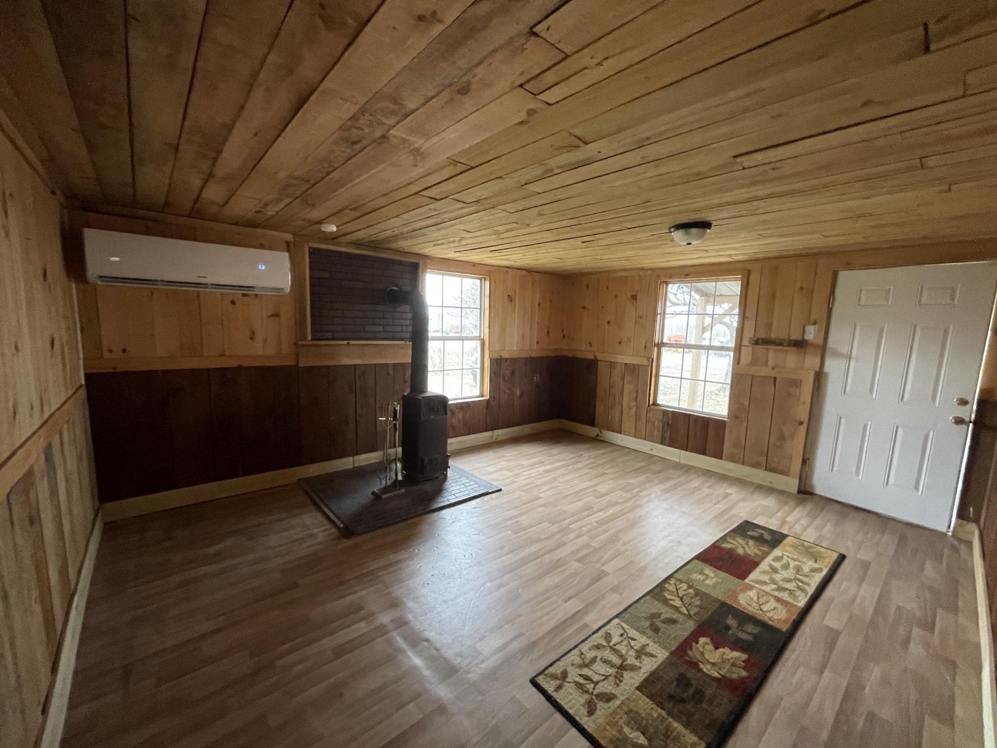 1995 Clarkrange Monterey Highway Monterey, TN 38574 - Photo 5 of 14 an empty room with wooden floor and windows