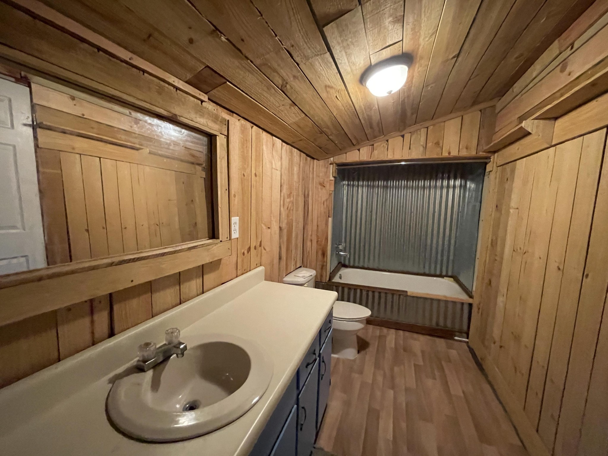 1995 Clarkrange Monterey Highway Monterey, TN 38574 - Photo 10 of 14 a bathroom with a sink and a large mirror