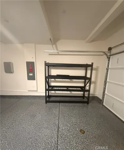 a view of room with stairs and furniture