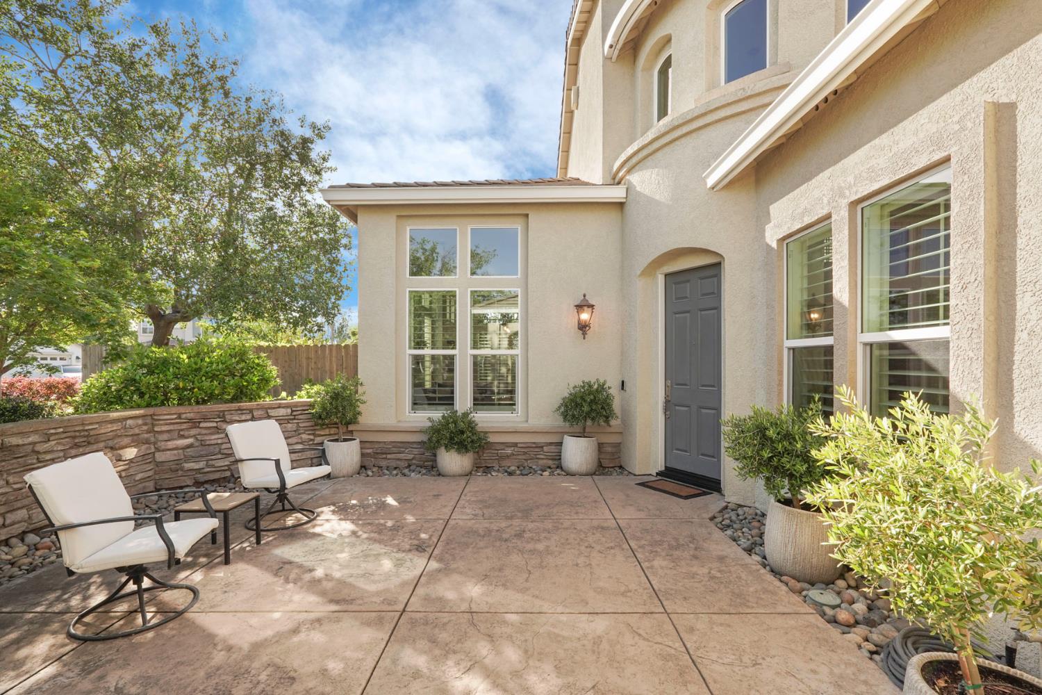 2227 Heavenly Way Lodi, CA 95242 - Photo 11 of 62 a view of a house with backyard sitting area and garden