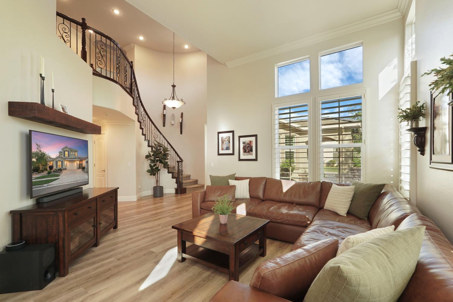 2227 Heavenly Way Lodi, CA 95242 - Photo 14 of 62 a living room with furniture and a floor to ceiling window