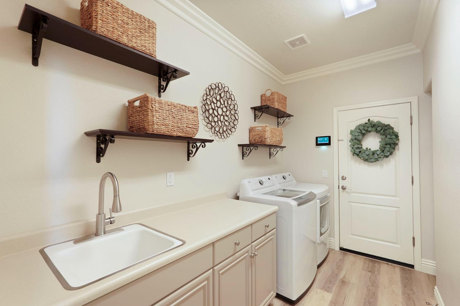 2227 Heavenly Way Lodi, CA 95242 - Photo 17 of 62 a utility room with dryer and washer