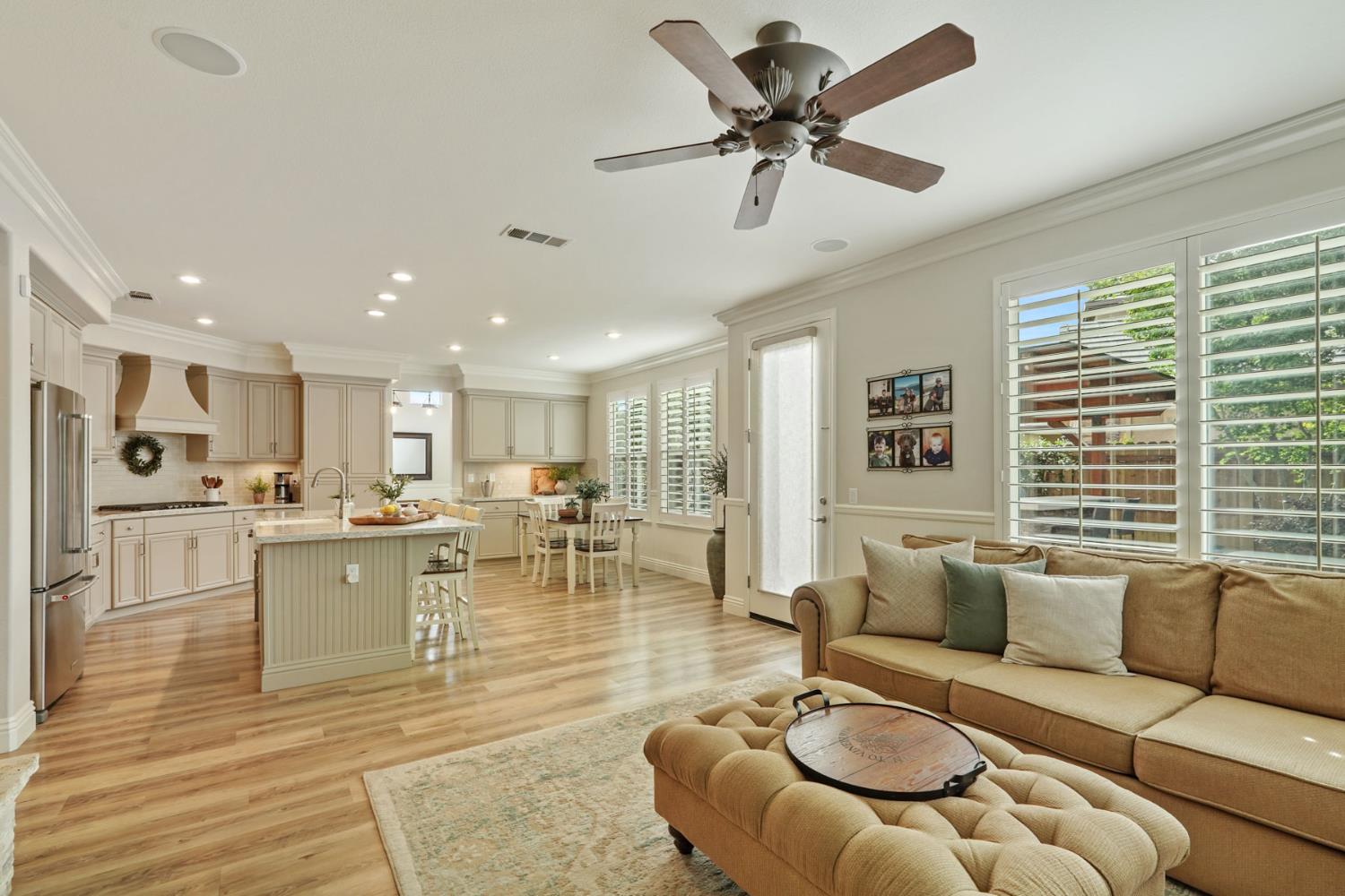 2227 Heavenly Way Lodi, CA 95242 - Photo 19 of 62 a living room with furniture kitchen view and a large window