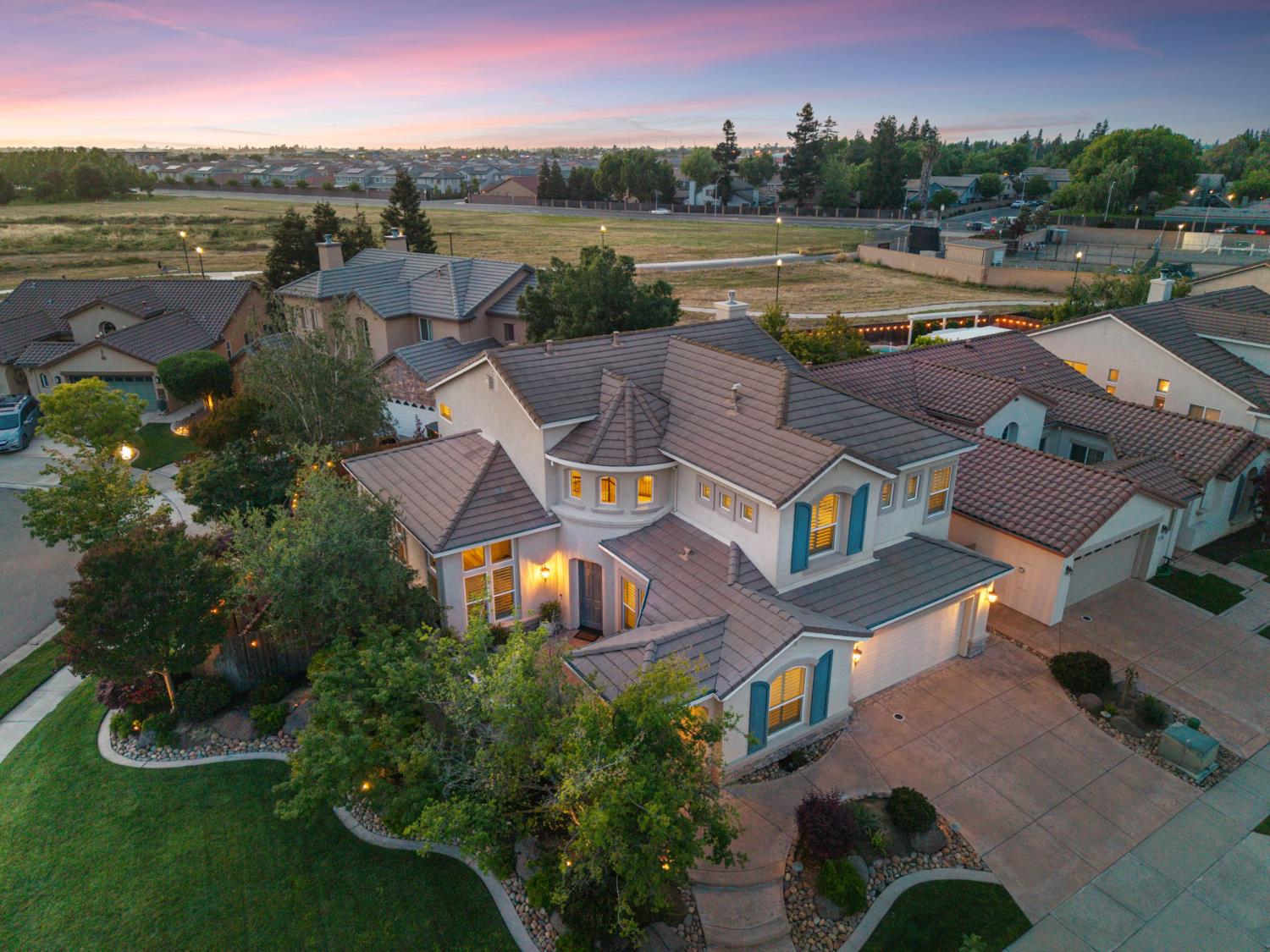 2227 Heavenly Way Lodi, CA 95242 - Photo 3 of 62 an aerial view of residential houses with outdoor space and river