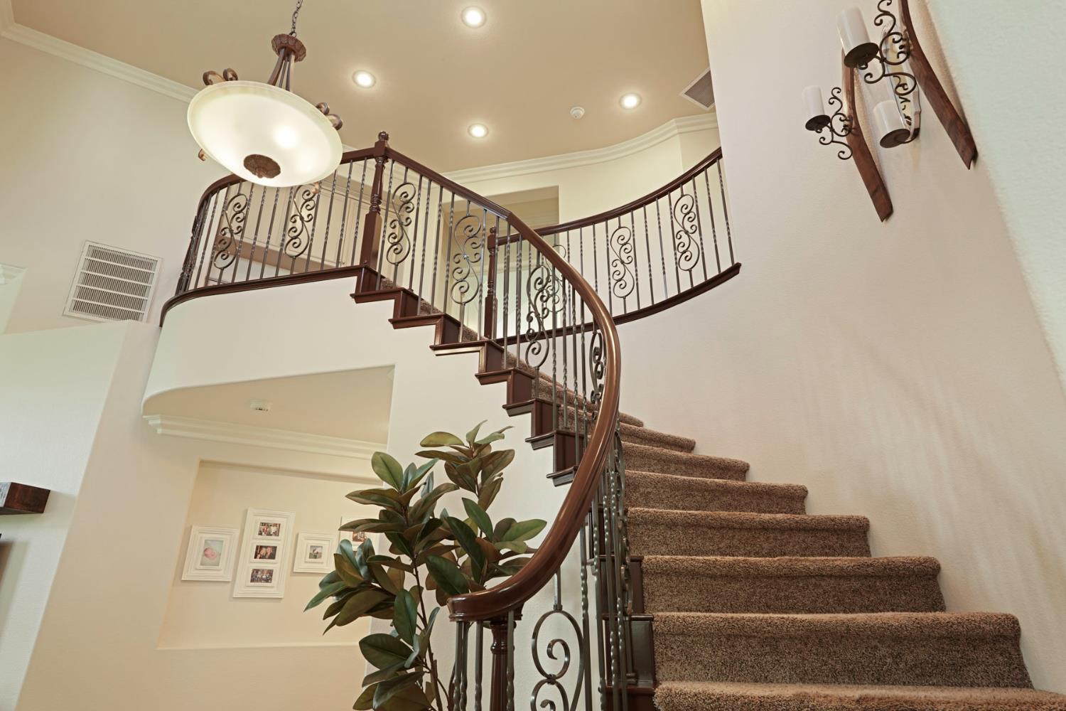 2227 Heavenly Way Lodi, CA 95242 - Photo 35 of 62 Check out the gorgeous wrought iron details at curved staircase