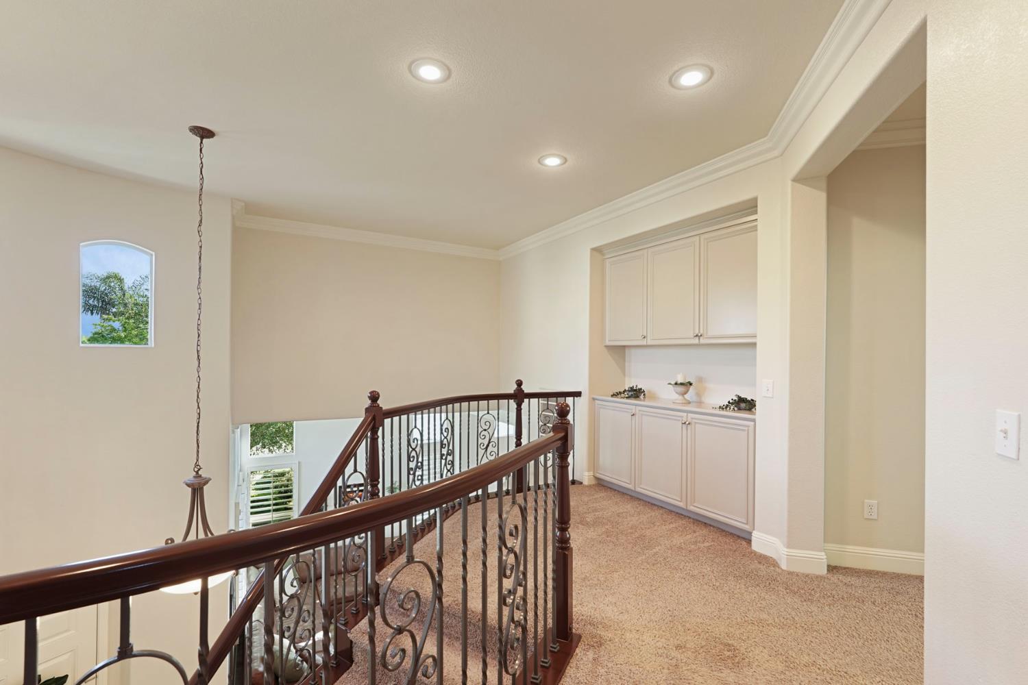 2227 Heavenly Way Lodi, CA 95242 - Photo 36 of 62 Upstairs landing with built-in linen cabinets