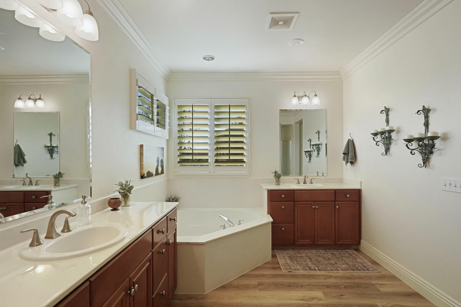2227 Heavenly Way Lodi, CA 95242 - Photo 41 of 62 a bathroom with a tub sink and mirror