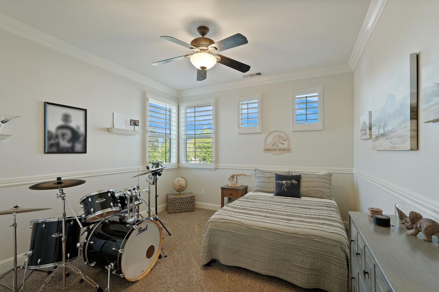 2227 Heavenly Way Lodi, CA 95242 - Photo 46 of 62 a bedroom with two beds and ceiling fan