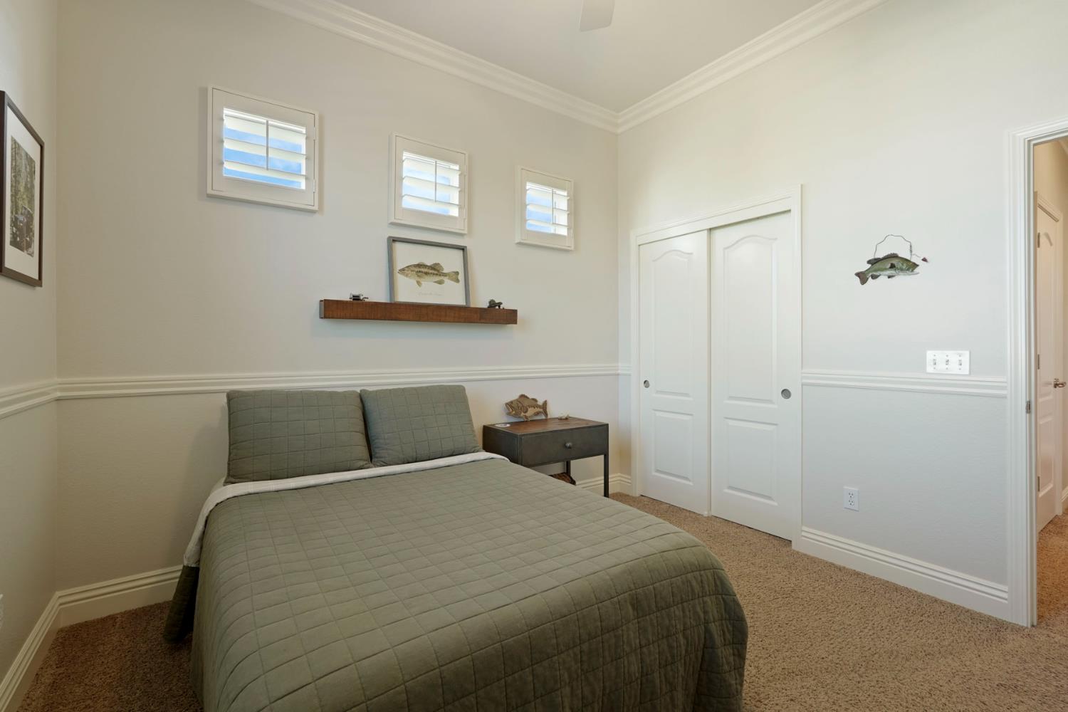 2227 Heavenly Way Lodi, CA 95242 - Photo 49 of 62 a bedroom with a bed and hallway
