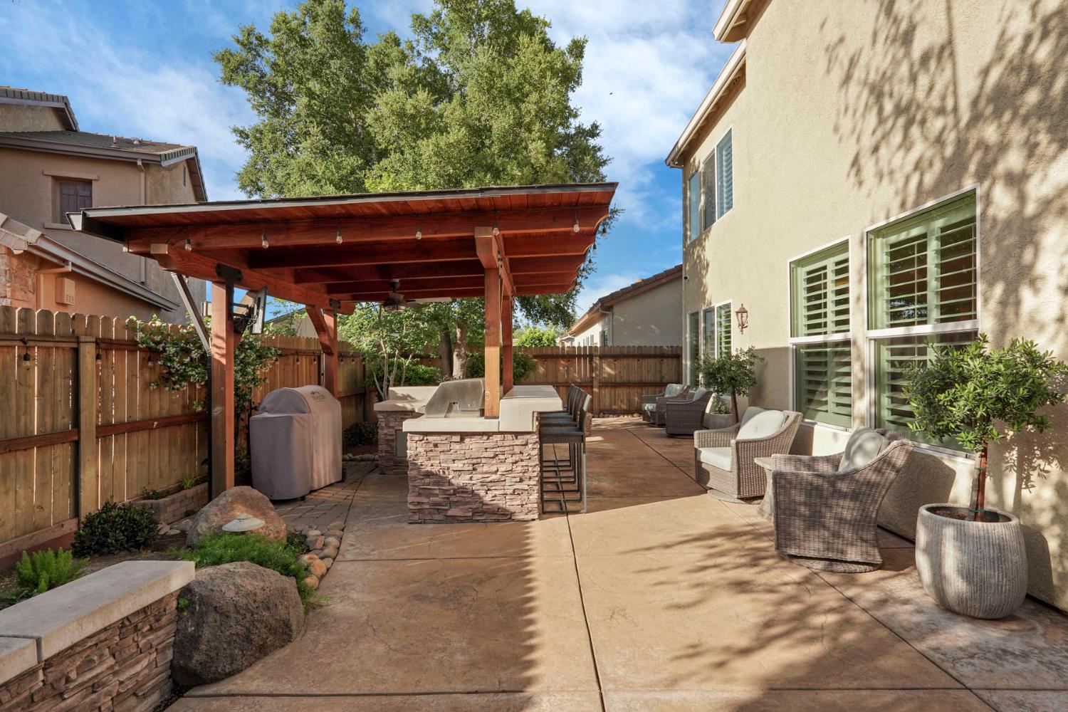 2227 Heavenly Way Lodi, CA 95242 - Photo 55 of 62 a view of a patio with couches and potted plants