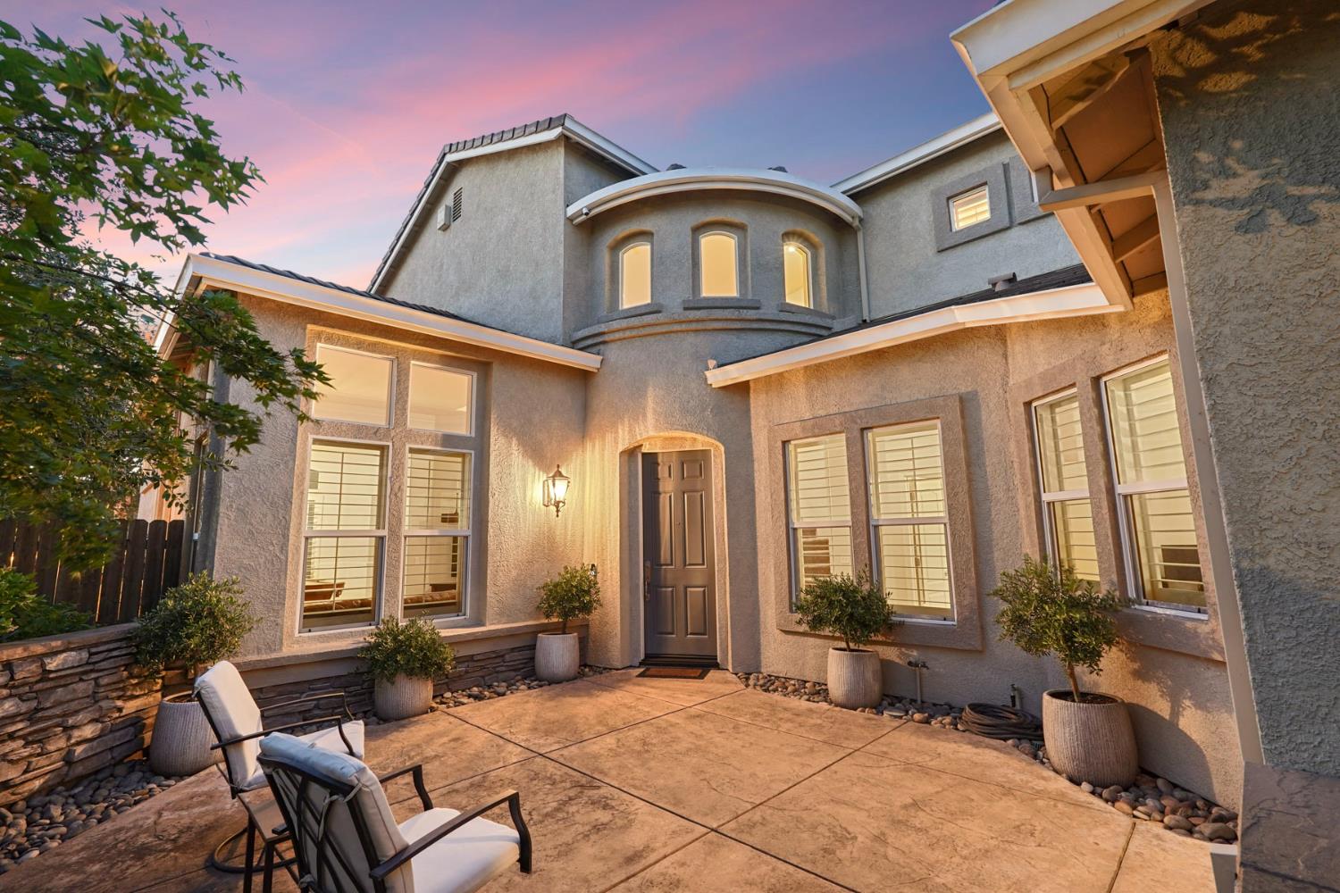 2227 Heavenly Way Lodi, CA 95242 - Photo 8 of 62 a front view of a house with outdoor seating