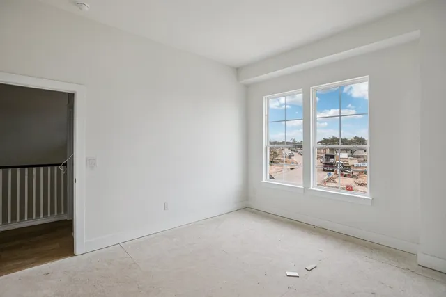 an empty room with windows