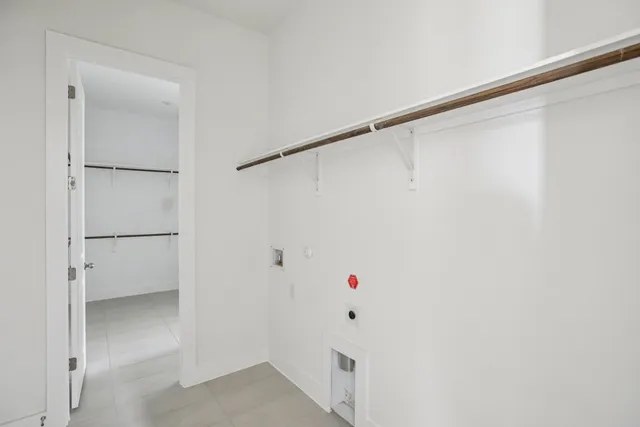 a view of an empty walk in closet