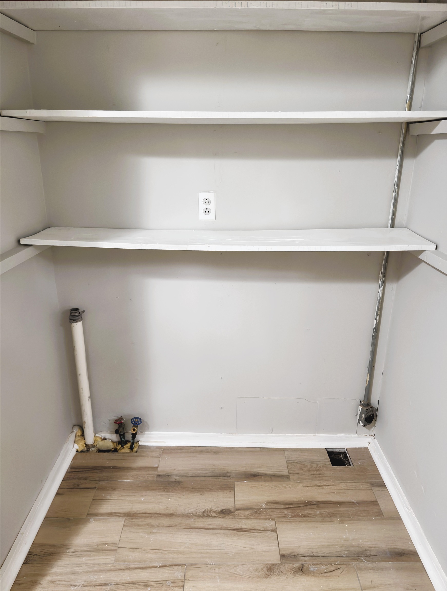 4071 Grey Road Memphis, TN 38108 - Photo 14 of 15 a view of a closet with wooden floor