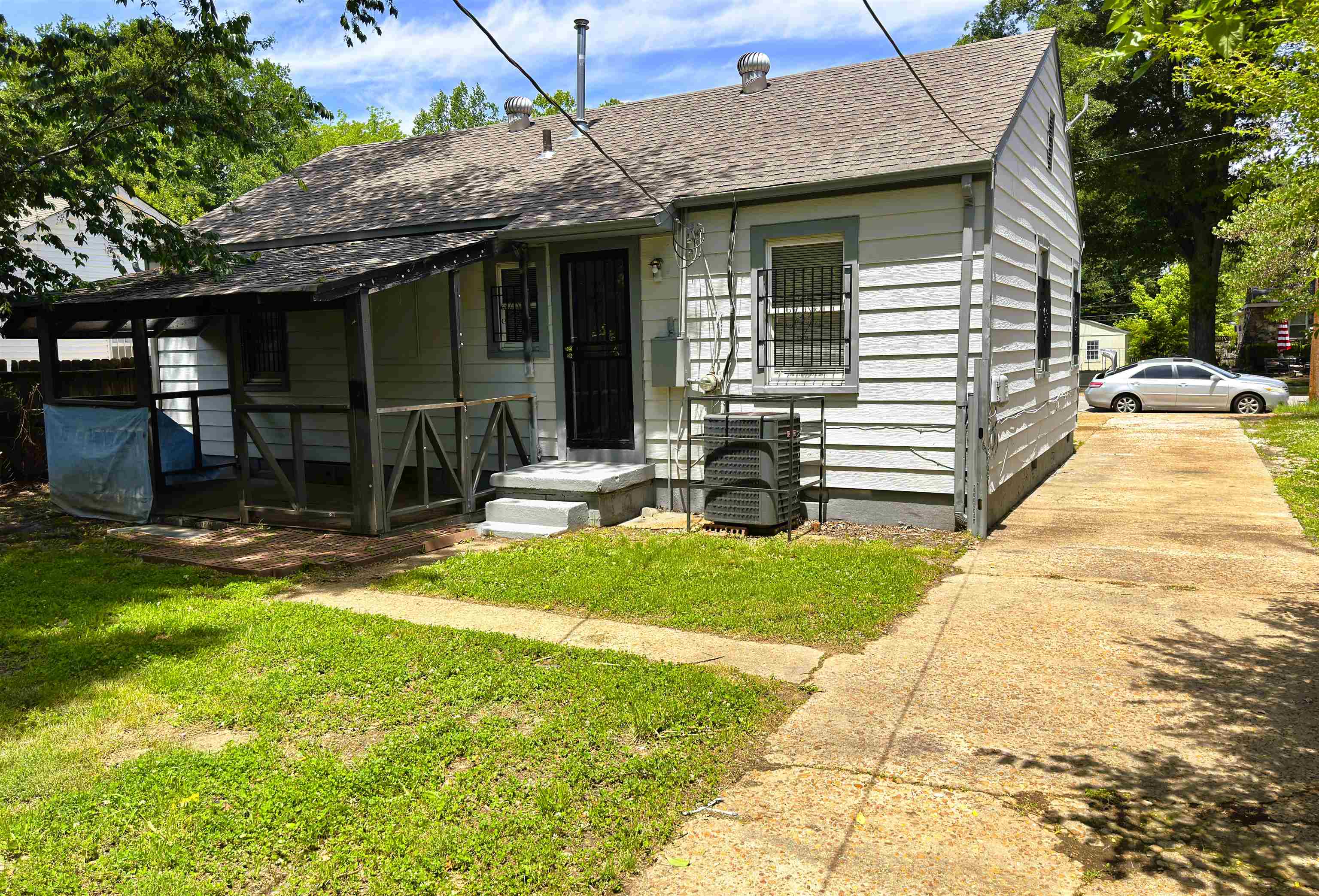 4071 Grey Road Memphis, TN 38108 - Photo 15 of 15 a view of a house with backyard and porch