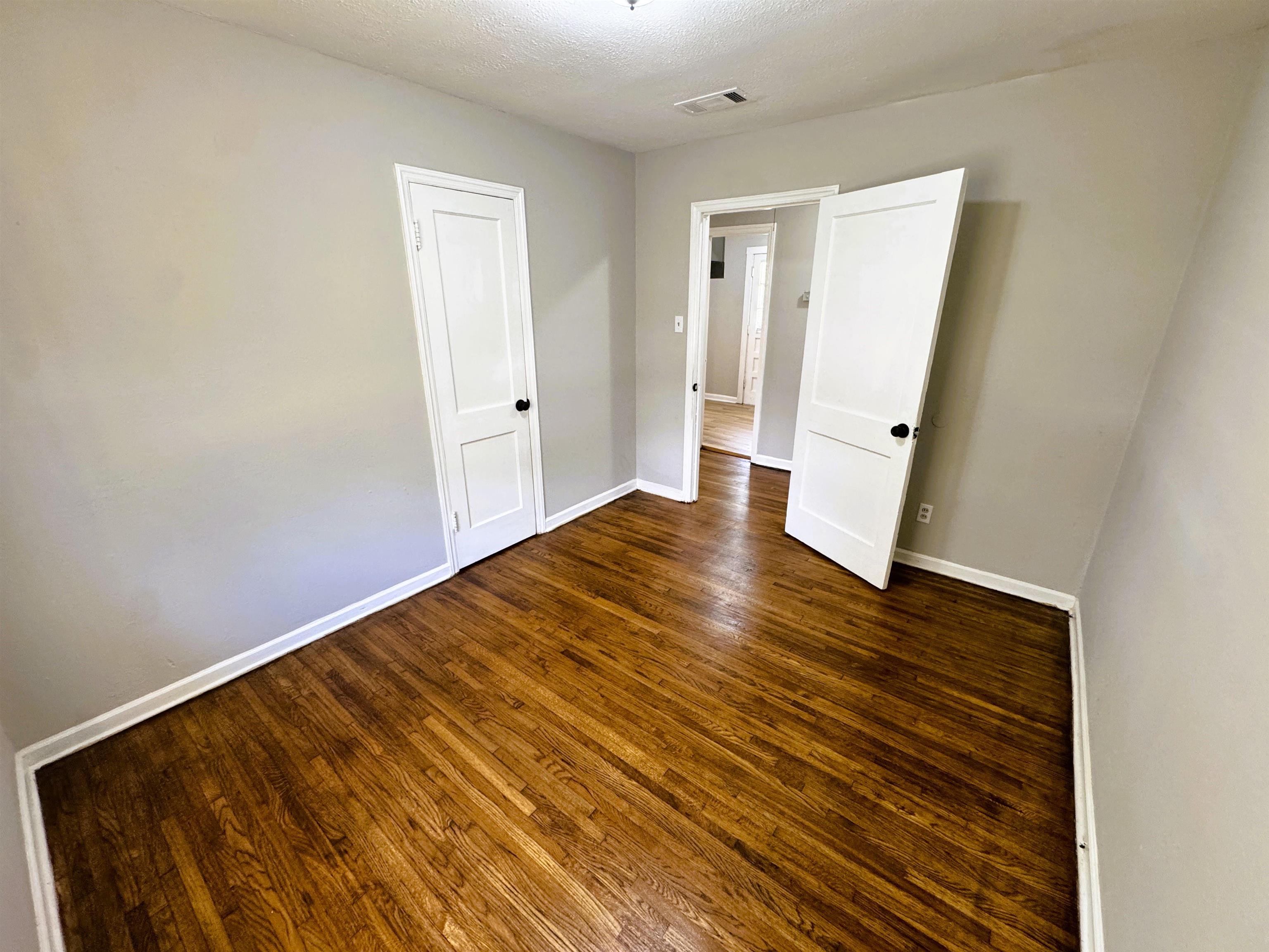 4071 Grey Road Memphis, TN 38108 - Photo 9 of 15 wooden floor in an empty room