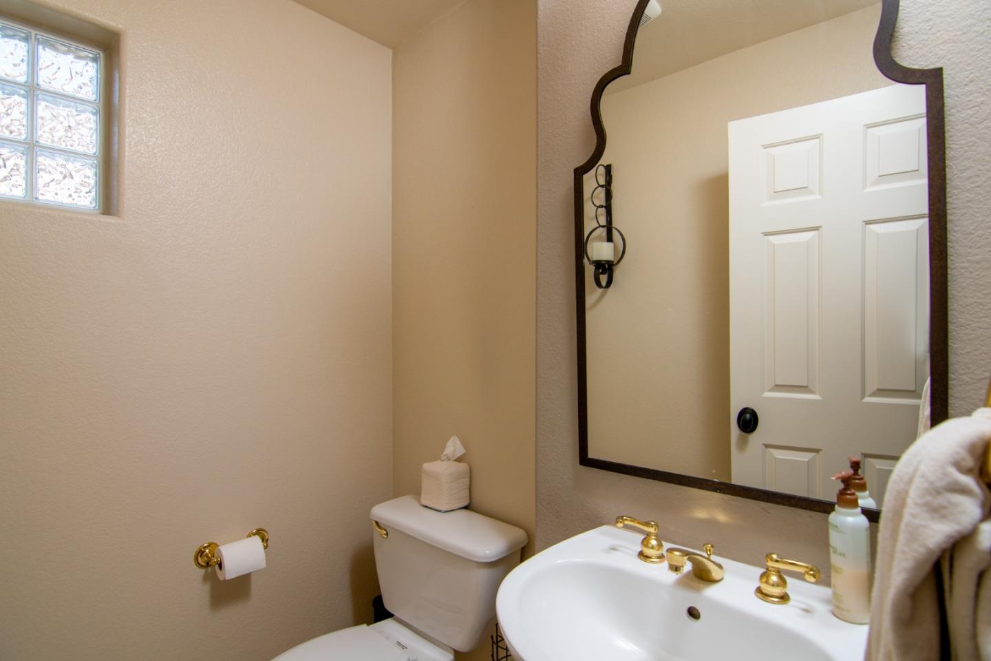 5871 Killarney Circle San Jose, CA 95138 - Photo 12 of 33 a bathroom with a sink toilet and shower