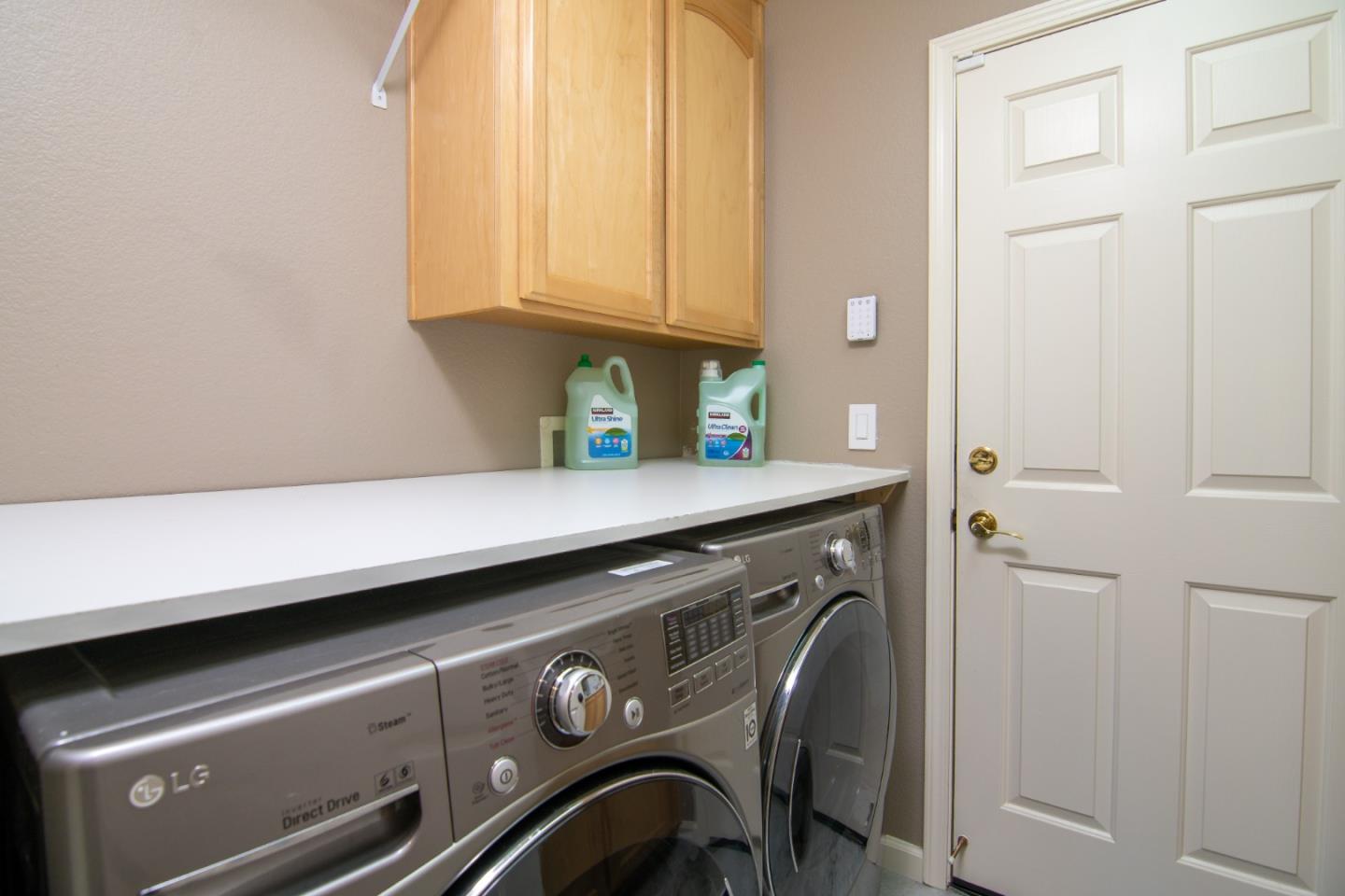 5871 Killarney Circle San Jose, CA 95138 - Photo 13 of 33 a close view of utility room with washer and dryer