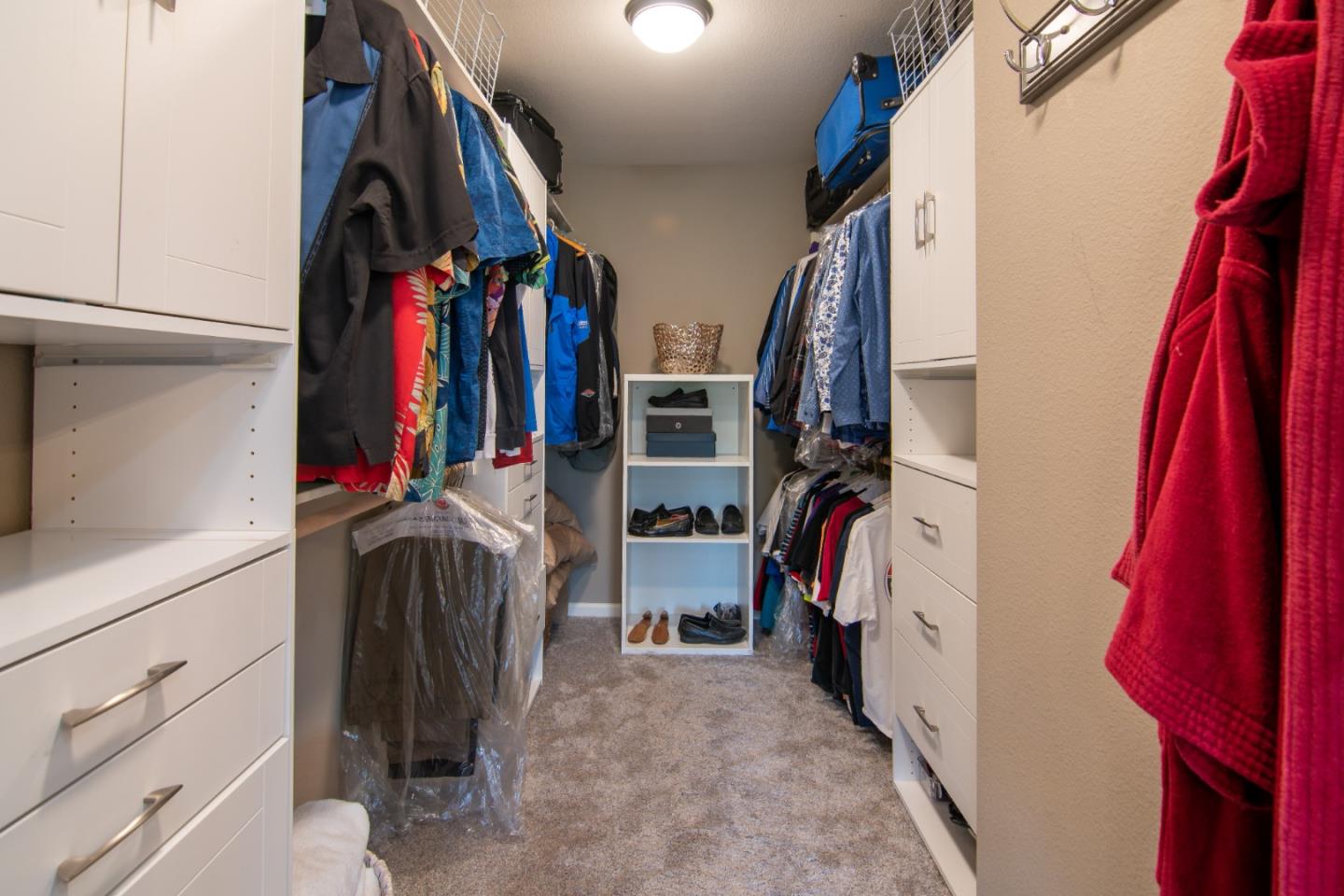 5871 Killarney Circle San Jose, CA 95138 - Photo 22 of 33 a view of walk in closet with clothes and shoes