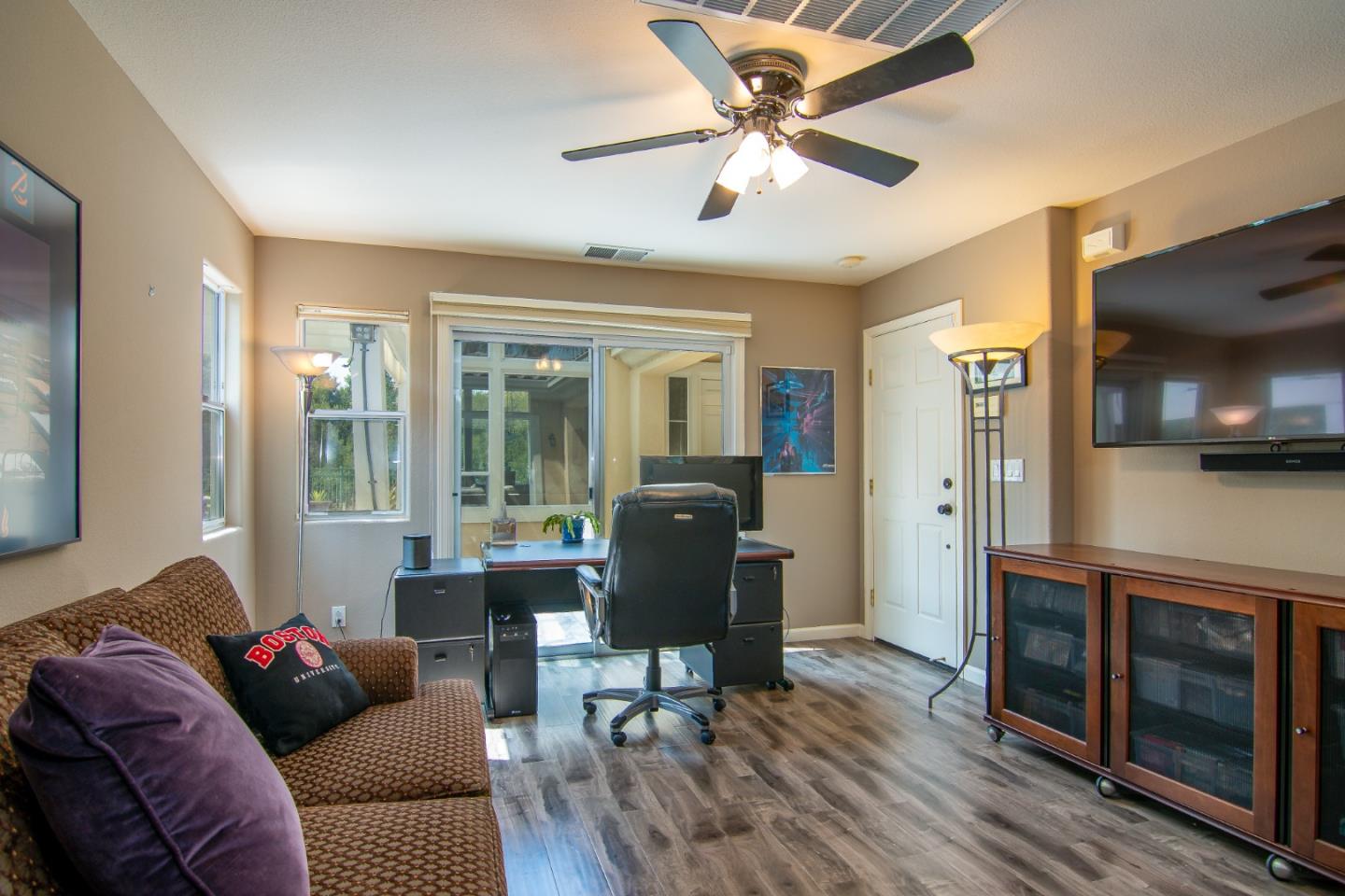5871 Killarney Circle San Jose, CA 95138 - Photo 26 of 33 a living room with furniture and a flat screen tv