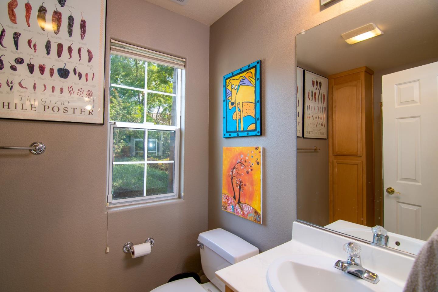 5871 Killarney Circle San Jose, CA 95138 - Photo 27 of 33 a bathroom with a sink and a mirror