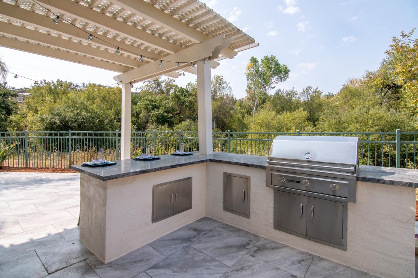 5871 Killarney Circle San Jose, CA 95138 - Photo 33 of 33 a kitchen with stainless steel appliances granite countertop a stove a sink and a refrigerator