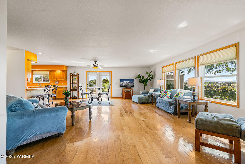 360 Orchardvale Road Zillah, WA 98953 - Photo 6 of 31 a living room with furniture and a large window