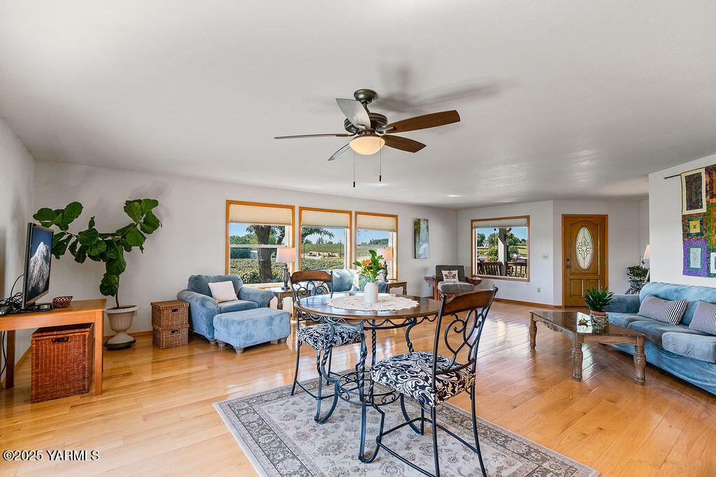 360 Orchardvale Road Zillah, WA 98953 - Photo 9 of 31 a view of a dining room with furniture window and outside view