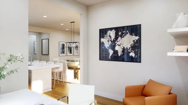 a living room with furniture and a painting