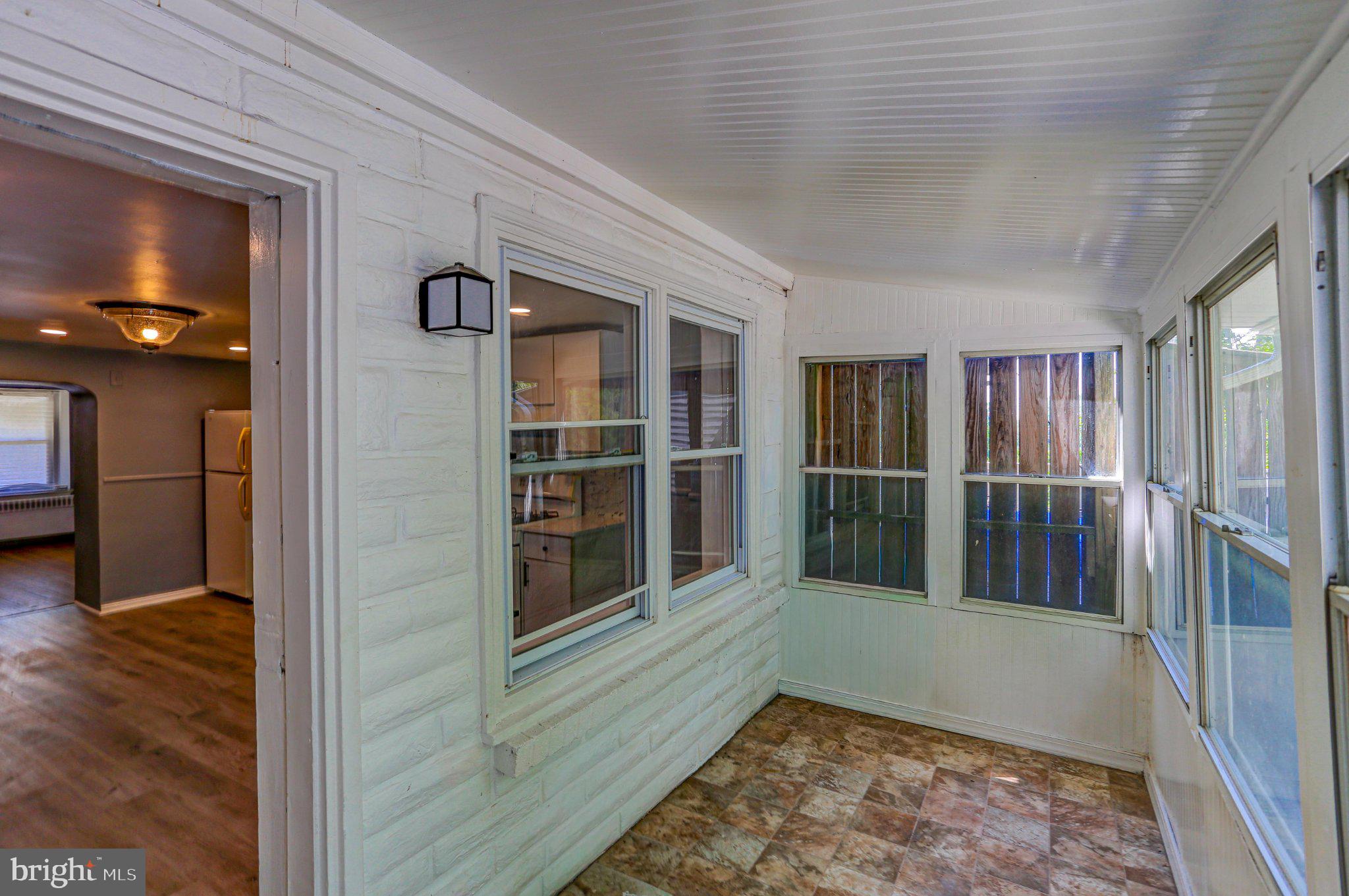 64 Blanchard Road Drexel Hill, PA 19026 - Photo 21 of 23 Enclosed back porch.