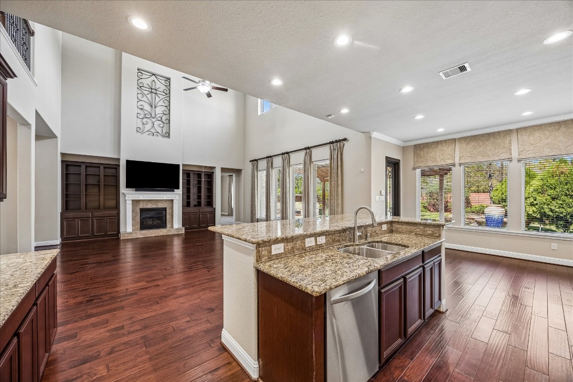 14123 Spindle Arbor Road Cypress, TX 77429 - Photo 16 of 45 Living area features an open layout with kitchen and breakfast. Great for entertaining. Access to patio via breakfast room.
