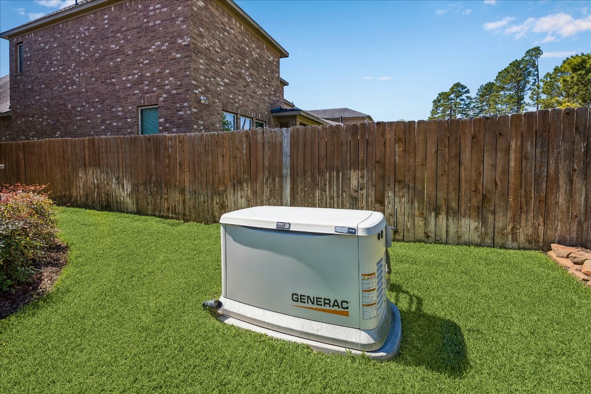 14123 Spindle Arbor Road Cypress, TX 77429 - Photo 39 of 45 Generac 24kw generator.