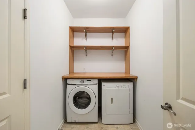 a utility room with a washer and dryer