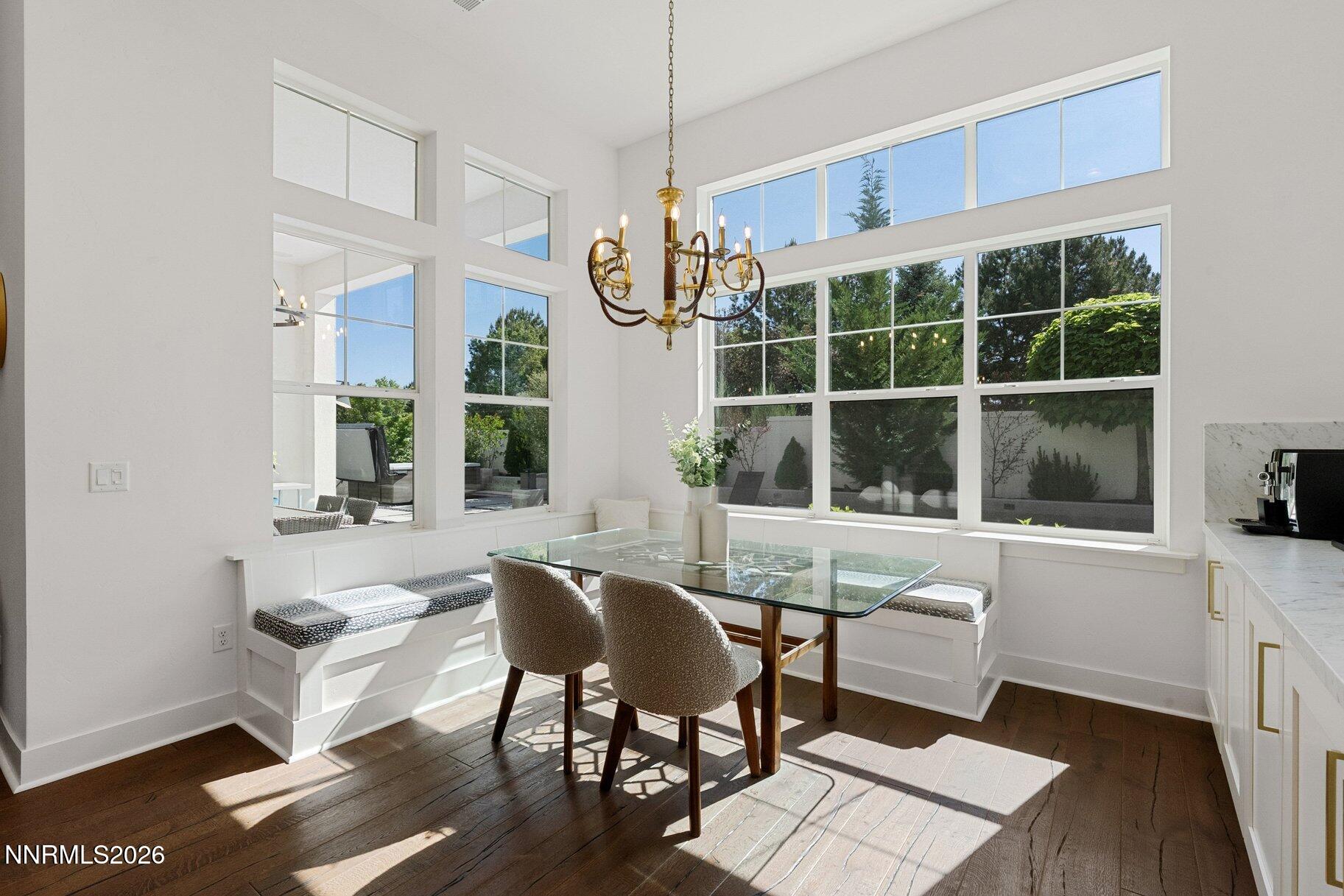 6110 South Pleasant Oak Trail Reno, NV 89511 - Photo 12 of 66 a view of a dining room with furniture window and outside view