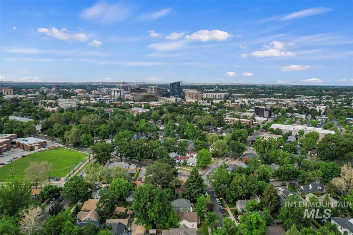 910 North 16th Street Boise, ID 83702 - Photo 42 of 47 Expansive aerial perspective showcasing a cityscape with residential areas and a prominent downtown skyline