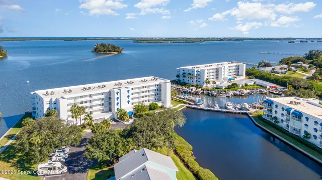 a view of a balcony with chairs